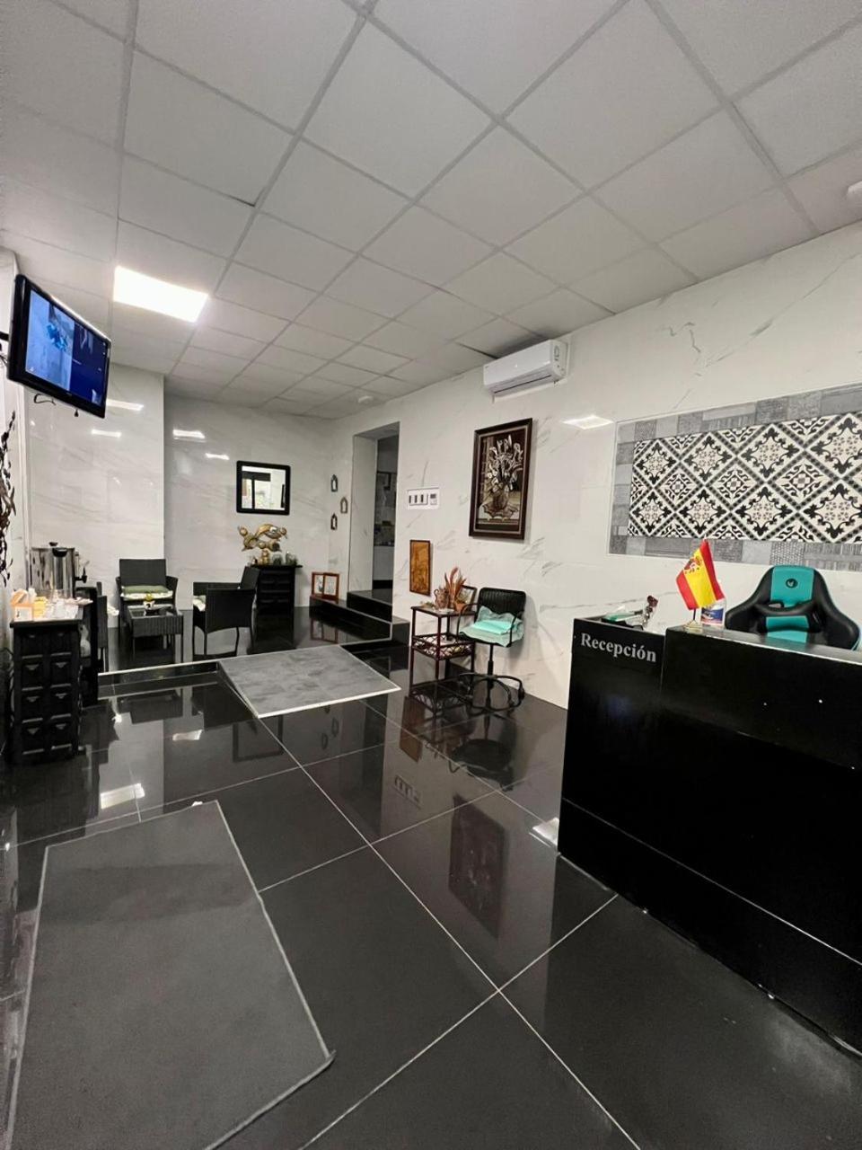 Hostal Milan Alicante Exteriör bild Reception area of the Embassy of Spain in Tirana